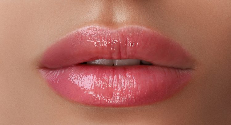 A close up of the lips and face of a woman